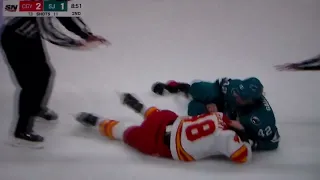 NHL hockey fight - Jonah Gadjovich(Sharks) vs. Dennis Gilbert(Flames)