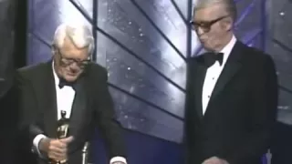 James Stewart receiving an Honorary Oscar from Cary Grant (1985)