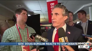 North Dakota Governor Doug Burgum reacts to the second Republican presidential debate