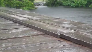 Fall rain falling on a wooden bridge The sound of nature induces sleep