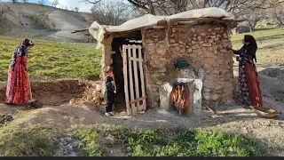 Building a hut in the mountains by a village woman