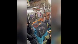 Homeless Couple Takes Man Food On NYC Train