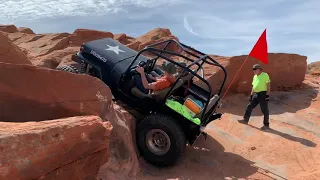 Vintage Jeeps on the sand and rocks of Sand Hollow. Double Sammy and The Chute