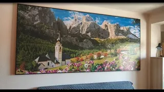 13,200 piece puzzle glued with plastic latex and white glue in a frame