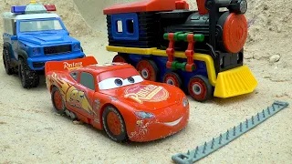 Police cars chase cars lightning mcqueen causing trouble with train tractor