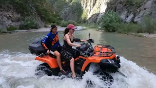 Riding ATVs in River