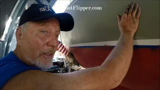 Boat Flipper Applies Flex Paste to the Catalina Sailboat