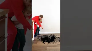 Arthur and Dad try to jump over a big hole in the floor!