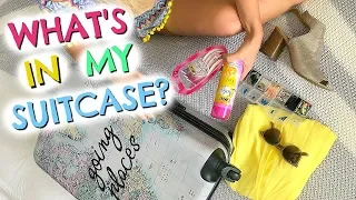 WHAT I PACK IN MY SUITCASE  & MY TRAVEL ESSENTIALS  |  PACK WITH ME  |  EMILY NORRIS AD