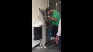 Drunk Man Trying To Use ATM Gets Blasted By His Beer