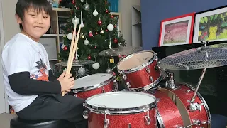 Drumming his own created song (9 years old little drummer)