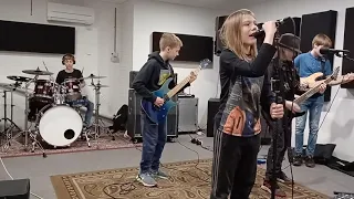 School Kid Band aged 11 to 13 Practicing Anastasia By Slash