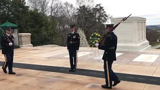 Woman told to remove her bag from the plaza. Changing of the guard at tomb of the unknown soldier.