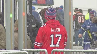 Disappointed Bills fans leave Highmark Stadium after playoffs loss