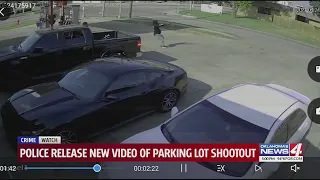 Police release new video of parking lot shootout