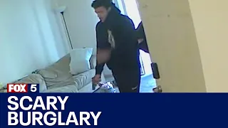 Video shows burglars armed with guns