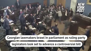 Georgian lawmakers get into wild brawl inside parliament