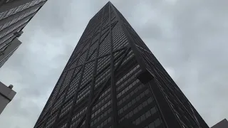 Three people rescued after elevator gets stuck between floors at Hancock building