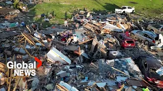 Tornadoes sweep through Texas as Iowa cleans up from deadly storms