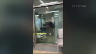Security guard no longer on the job after video shows him push down a man with a cane