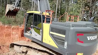 Building The last Section Of Road Through The Woods