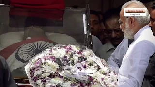 The last journey of Kalaignar: Karunanidhi laid to rest at Chennai's Marina Beach