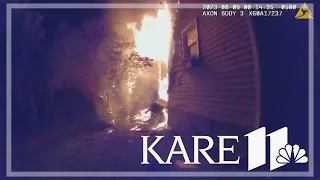 Bodycam: Deputy catches children dropped from second story of burning home