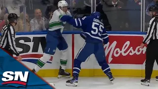 Maple Leafs' Giordano Goes the Distance with Canucks' Joshua After Big Hit on Kampf