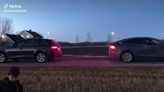 Audi q7 vs  Tesla X