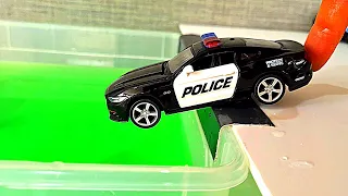 Die cast truck and cars falling into water video selection