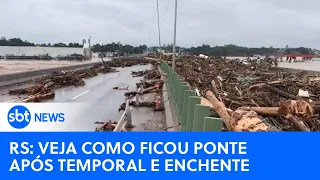 RS: Ponte do rio Taquari emerge tomada de entulho e troncos após temporal e enchente