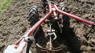 Plowing with 2 wheel tractor. Pflügen einachser MHM.