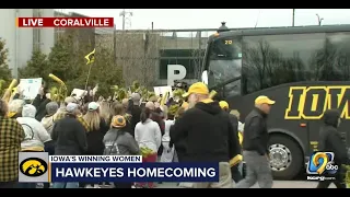 Hawkeye women arrive at Iowa River Landing in Coralville