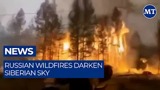 Russian Wildfires Darken Siberian Sky | The Moscow Times