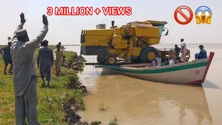 Harvesting Machine Loading On Boat in Sindh River || Newholand 8070 Harvester Machine