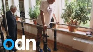 Paralysed man walks again after pioneering treatment