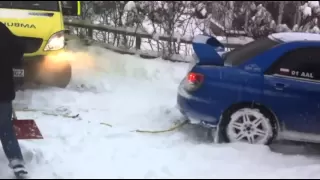 subaru pulling ambulance out of snow south london