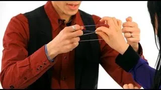 How to Do the Linking Rubber Band Trick | Magic Tricks