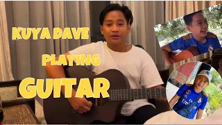 KUYA DAVE PLAYING GUITAR