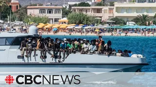 Lampedusa flooded with thousands of migrants