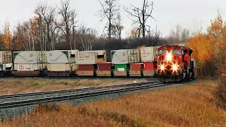 EMD's Running Notch 8 Around Sharp Bend Pulling A Massive Train in Alberta!