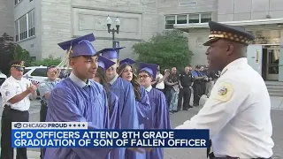 Officers attend middle school graduation for son of fallen CPD officer