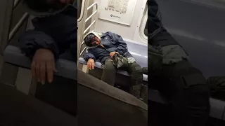 Funny Sleeping woman in New York Metro