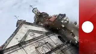 Amateur video: Quake tears down bell tower of oldest church in Philippines