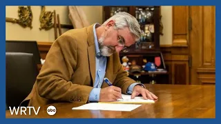 Gov. Holcomb signs bill banning gender transition procedures for minors