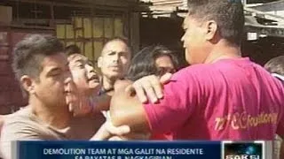 Demolisyon sa Brgy. Payatas B, nauwi sa gulo; mga residente, iginiit na iligal ang demolisyon