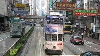 Hong Kong: Tram ride on the "ding ding" tram traveling west along Hennessy Road from Causeway Bay