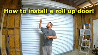 Installing a roll up shop door. #734