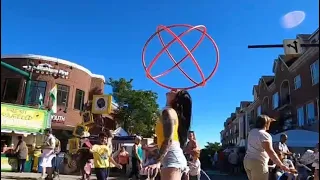 Hula hoop street performance at art festival