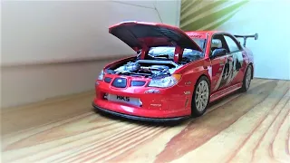 1/24 scale cars  pushed by hand, driving on the windowsill